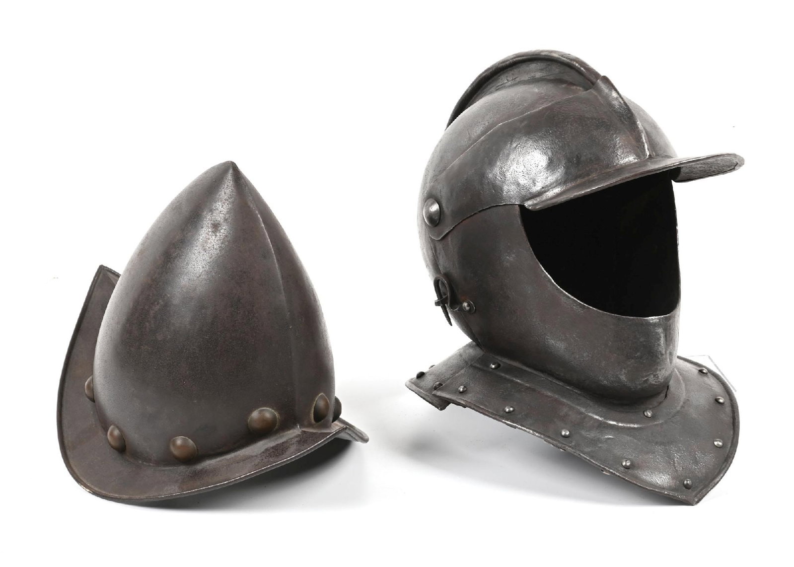 LOT OF 2: BURGONET AND MORION HELMETS.: Lot consists of (A) After a continental Burgonet, Skull, cheek defenses, visor, and neck lames as single pieces attached by rivets. Appears to be Victorian based on the method of construction,