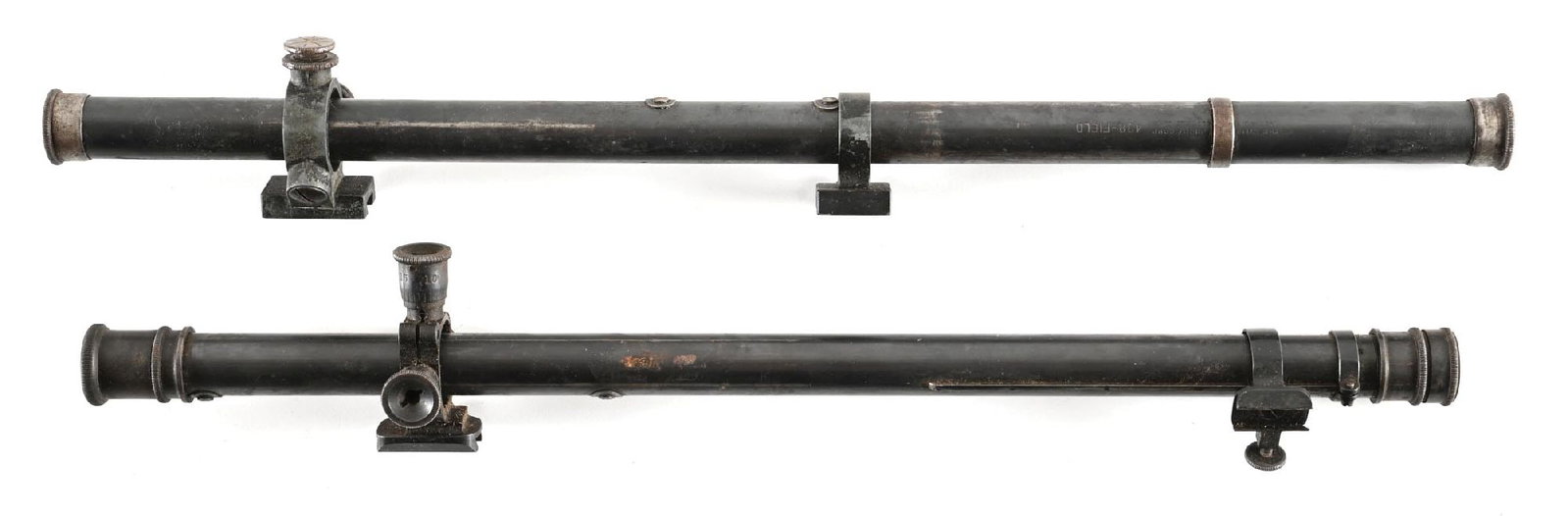 LOT OF 2 PRE-WAR LYMAN 3/4" TUBE RIFLE SCOPES.: This lot consists of a 5A Model as well as a Model 438 Field. (A) 16" long 3/4" tube scope and stamped with the Lyman 5A model designation. Adjustable rear mount. Finish is standard blue, crosshair