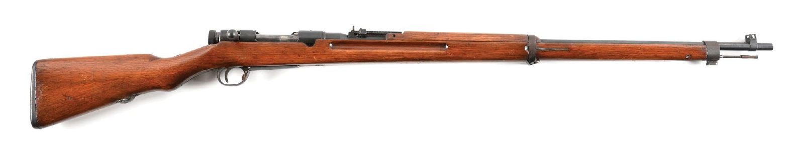 (C) NAGOYA ARSENAL TYPE 38 ARISAKA BOLT ACTION RIFLE.: Series 27 production. Finished in rust blue with straw small parts. Protected blade front sight and ladder rear. Standard hardwood stocks. Imperial chrysanthemum is intact. CONDITION: Fine. The vast m