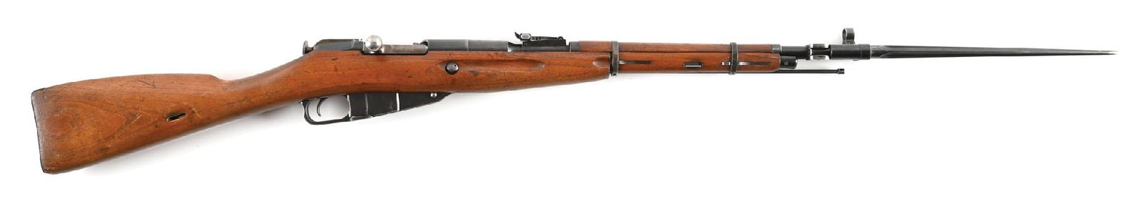 (C) POLISH CIRCLE 11 RADOM WZ.44 MOSIN-NAGANT BOLT ACTION CARBINE.: Manufactured in 1952 as a Polish copy of the Soviet M44 carbine. Finished in blue with a hooded post front sight, 1000 meter graduated tangent rear, birch stocks, and a folding cruciform spike bayonet