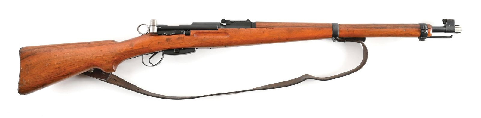 (C) SWISS K31 STRAIGHT PULL BOLT ACTION CARBINE.: Manufactured in 1946. Classic arsenal blued finish. Protected blade front sight and 1500 meter graduated tangent rear. Walnut stock with standard blued mounts. Externally visible numbers are matching.