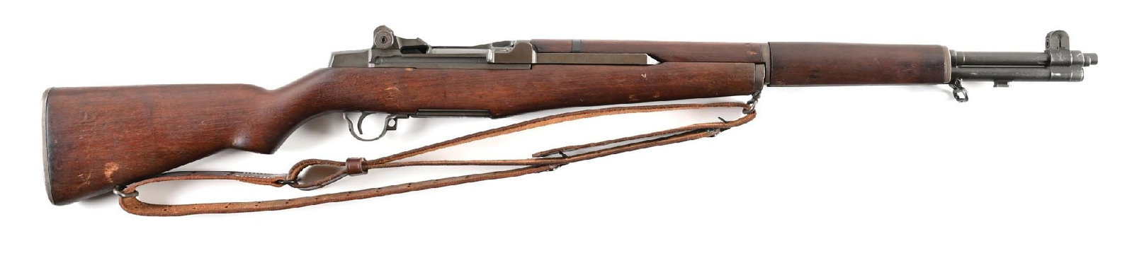 (C) SPRINGFIELD ARMORY M1 GARAND SEMI-AUTOMATIC RIFLE.: Manufactured circa February 1944. Springfield barrel is dated "3 44". Fitted with Post-War style sights. Rebuilt internals. Classic walnut stocks with boxed "P" proof at the wrist and pained "3-11" ra