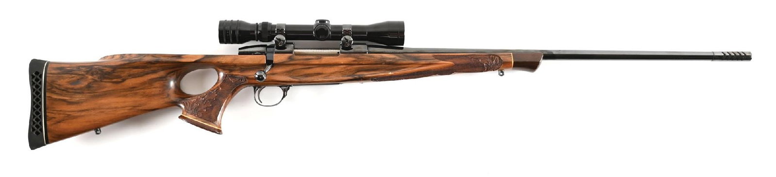 (C) QUALITY CUSTOM SAKO L579 FORRESTER .243 BOLT ACTION RIFLE.: The basis for this custom rifle is the venerable Finnish Sako L579 barreled action with muzzle brake. Jeweled bolt, the high polish blue finish and has a mounted Redfield 1" 2x7 scope with crosshair r