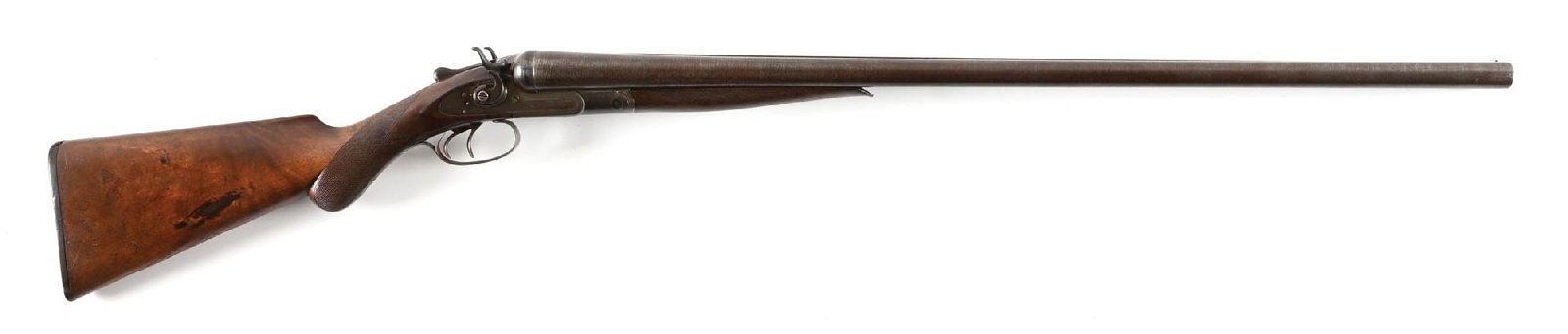 (A) RARE EARLY SYRACUSE 10 GA. LC SMITH TRAP SIDE BY SIDE BAR HAMMER SHOTGUN.: It is estimated that only about 5223 bar action Smith were made between 1884 through 1887 at the Syracuse facility. This example is an F-grade with the only Trap affiliation being the gutta percha but