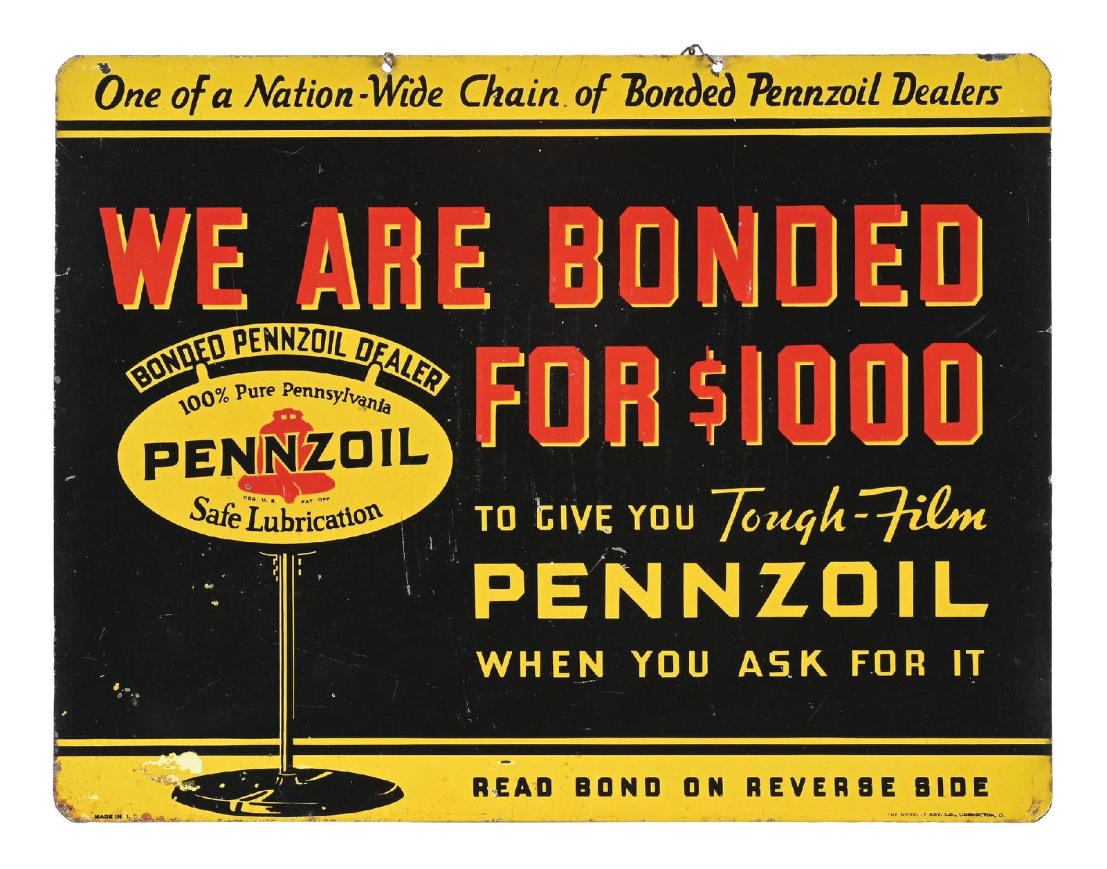 PENNZOIL MOTOR OIL DEALER GUARANTEED BOND TIN SIGN: DST. Dated 1933. Maker marked Novelty Advertising Co. CONDITION: Each side showing excellent color and gloss, with some moderate areas of light surface scratches and general age wear. Outer edges show