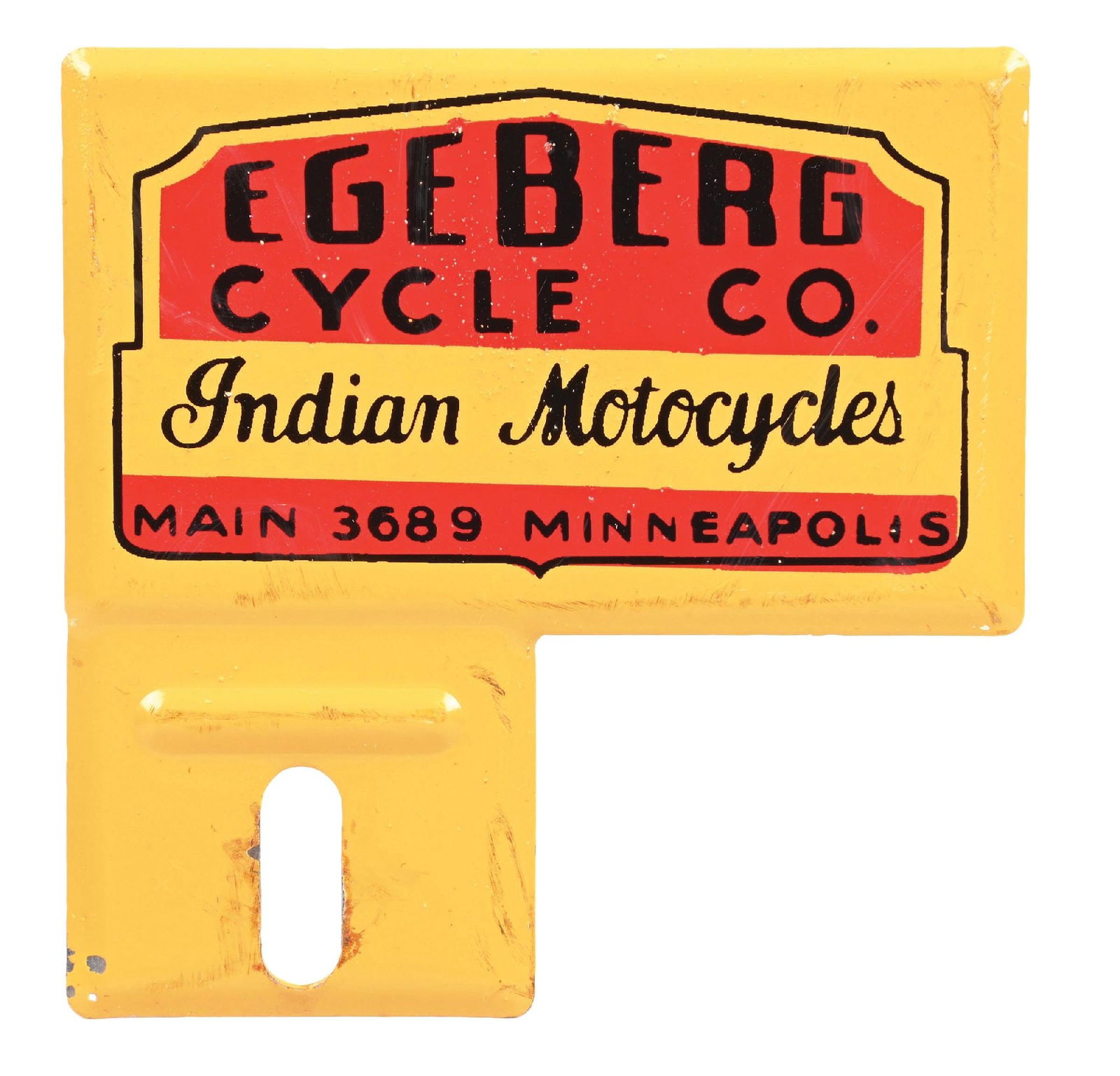 INDIAN MOTORCYCLES EGEBERG CYCLE CO. TIN DEALERSHIP LICENSE PLATE TOPPER: SST. C. 1960s. CONDITION: Outstanding throughout, appearing NOS, showing bright color and gloss. Minor areas of light surface wear from storage, but overall brilliant. Light wear along the edges. Cond