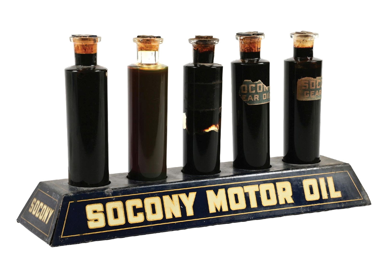 RARE SOCONY MOTOR OIL SAMPLE STORE DISPLAY CASE WITH GLASS OIL BOTTLES: DST. C. 1930s. CONDITION: Base in very good condition, showing bright colors with minor areas of surface scratching and general age wear, with some light paint loss at the right side. Display shows