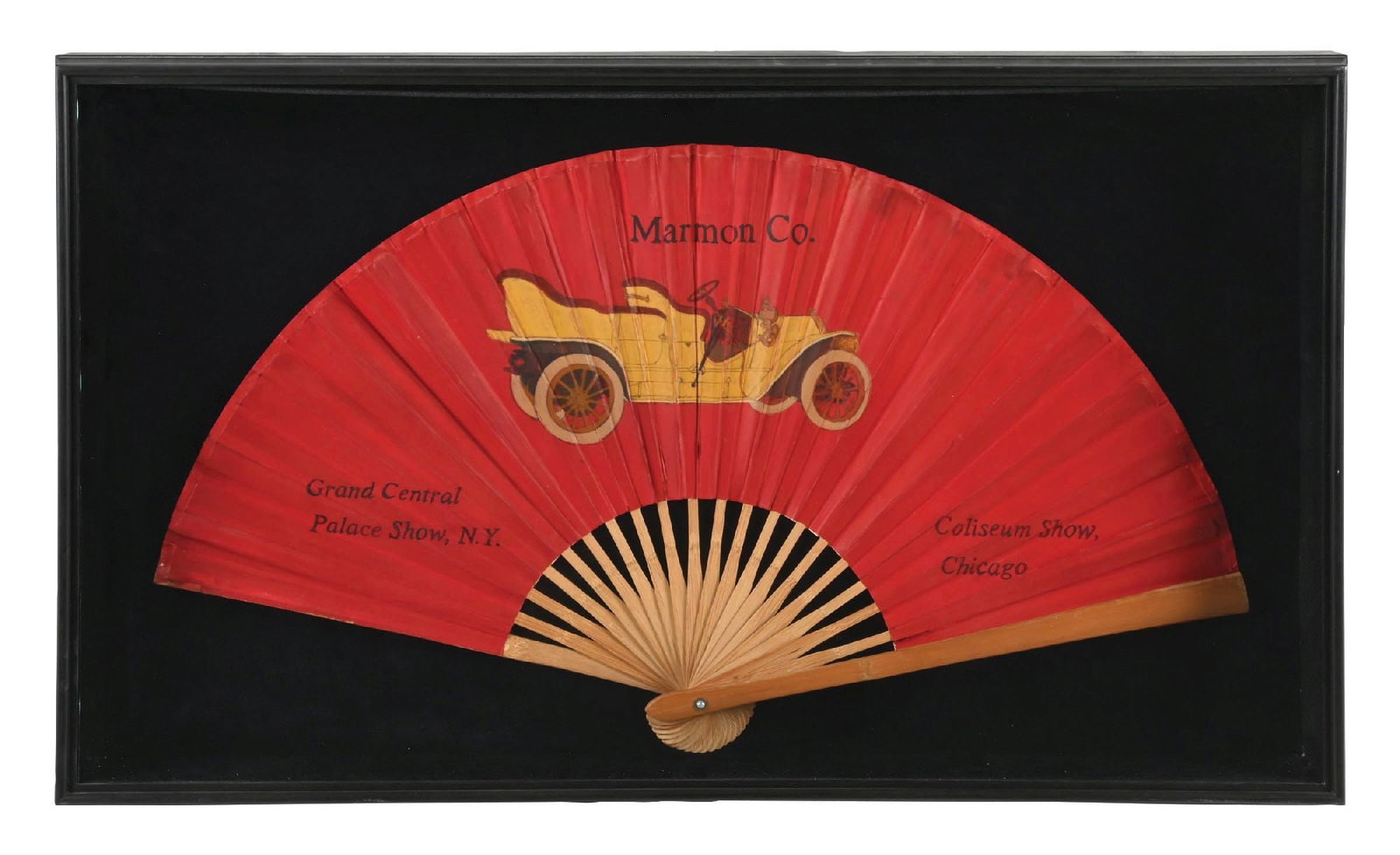 MARMON CO. GRAND CENTRAL PALACE SHOW, N.Y. FRAMED DECORATIVE FAN: Marmon Automobile Company Advertising Fan showing early Touring Car graphic. Fan is professionally framed in large shadow box like frame giving the piece excellent display ability. CONDITION: Fan show
