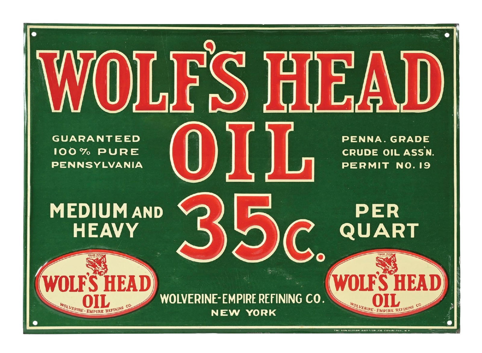 RARE WOLF'S HEAD OIL EMBOSSED TIN SIGN (1 of 3)