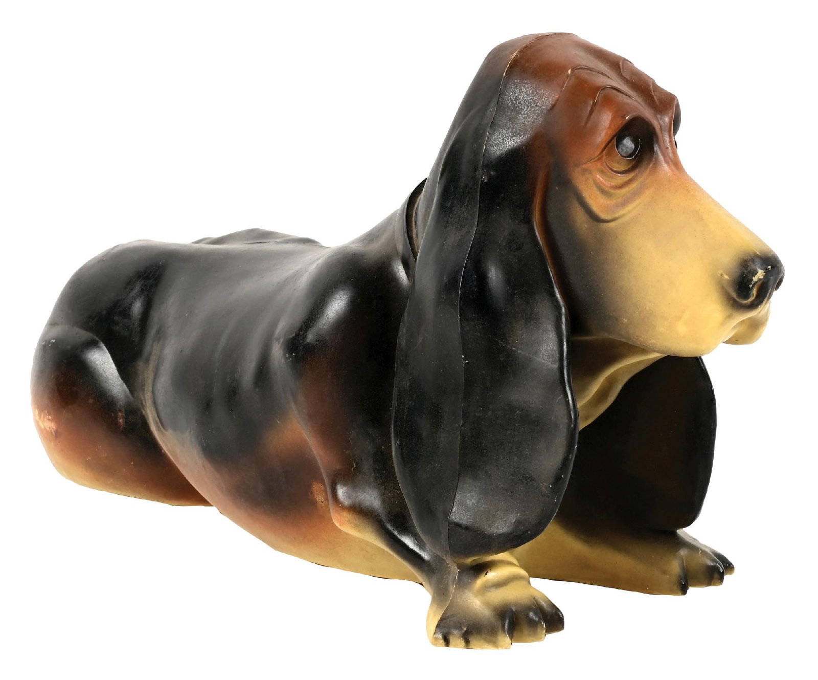 FLYING A GASOLINE BASSET HOUND ADVERTISING COIN BANK: C. 1950s. CONDITION: Overall very good showing light general age and use wear. Body showing great original paint with light chips. Flying A graphic in excellent condition. Missing coin cap at the bott