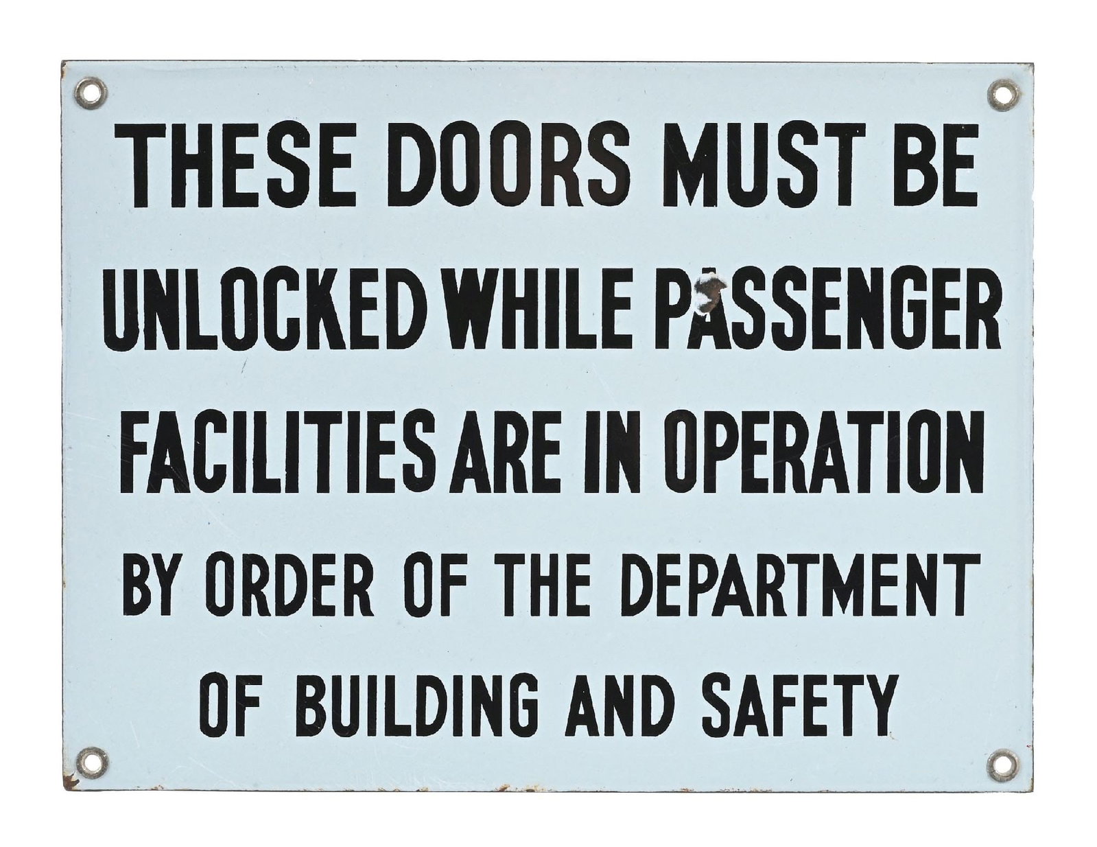 THESE DOORS MUST BE UNLOCKED WHILE PASSENGERS FACILITIES ARE IN OPERATION PORCELAIN SIGN (1 of 2)