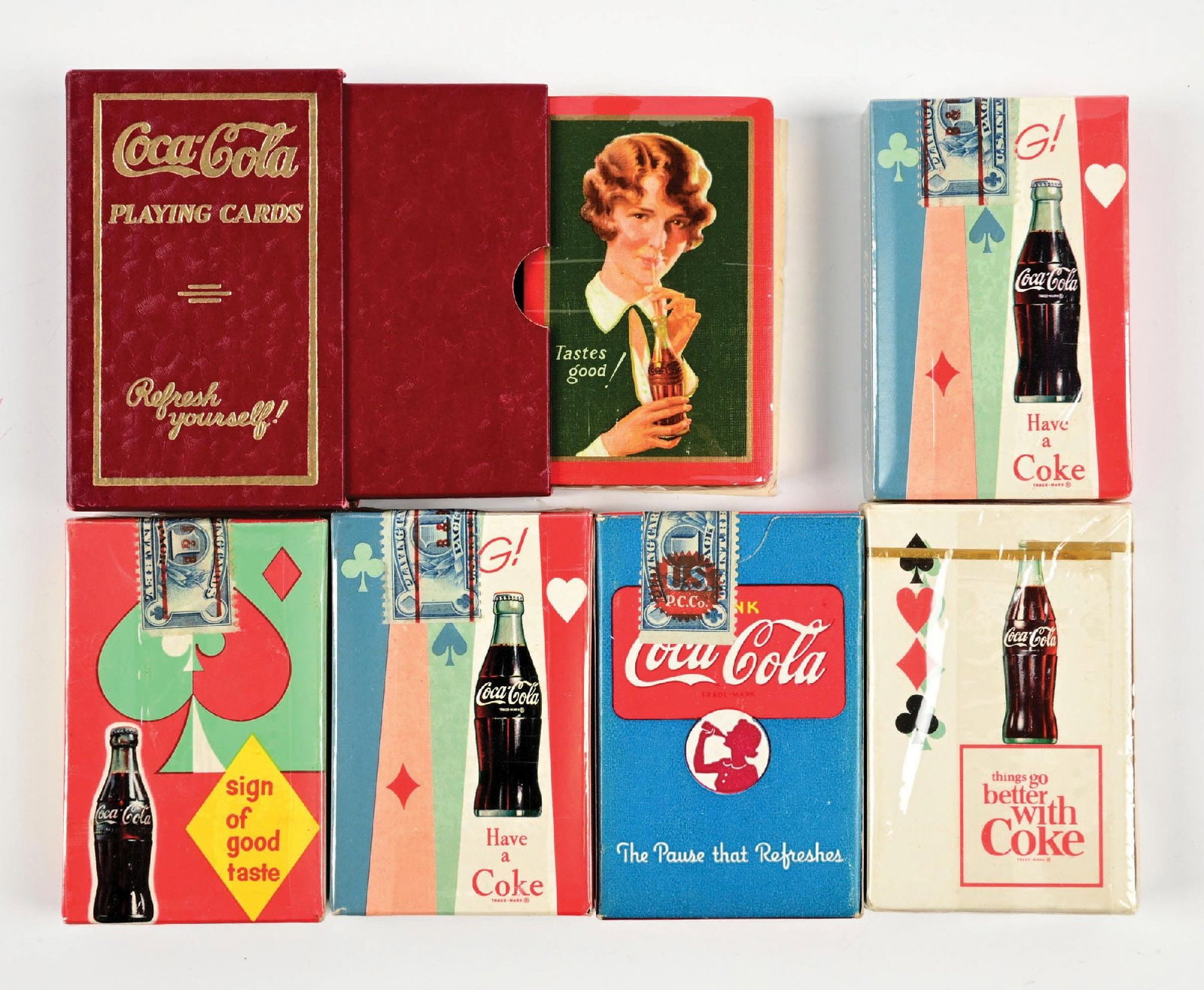 COLLECTION OF 6: COCA-COLA PLAYING CARDS: A nice collection of six decks of Coca-Cola playing cards from the 1950's-1960's with great graphics and color. CONDITION: The are all clean, with some never have been opened. Some show light storage
