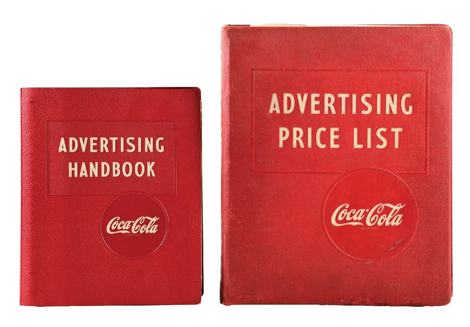 COLLECTION OF 2: COCA-COLA ADVERTISING MANUALS: A nice collection of two c. 1950s advertising manuals from Coca-Cola. CONDITION: Both shows light wear to the outer binders, with the interior pages remaining clean with some slight yellowing to the