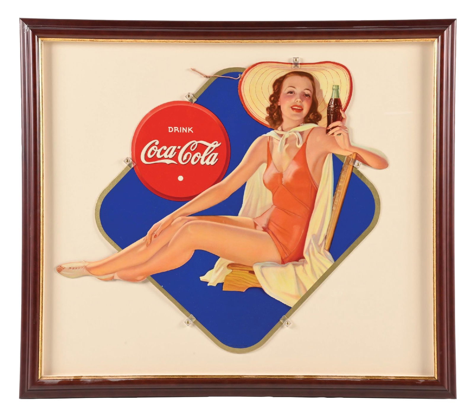 COCA-COLA DIE-CUT SIGN W/ BATHING BEAUTY GRAPHIC: A clean example of this c. 1940s single sided die-cut cardboard sign from Coca-Cola featuring the bathing beauty graphic, with the original string hanger still attached. CONDITION: The field and outer