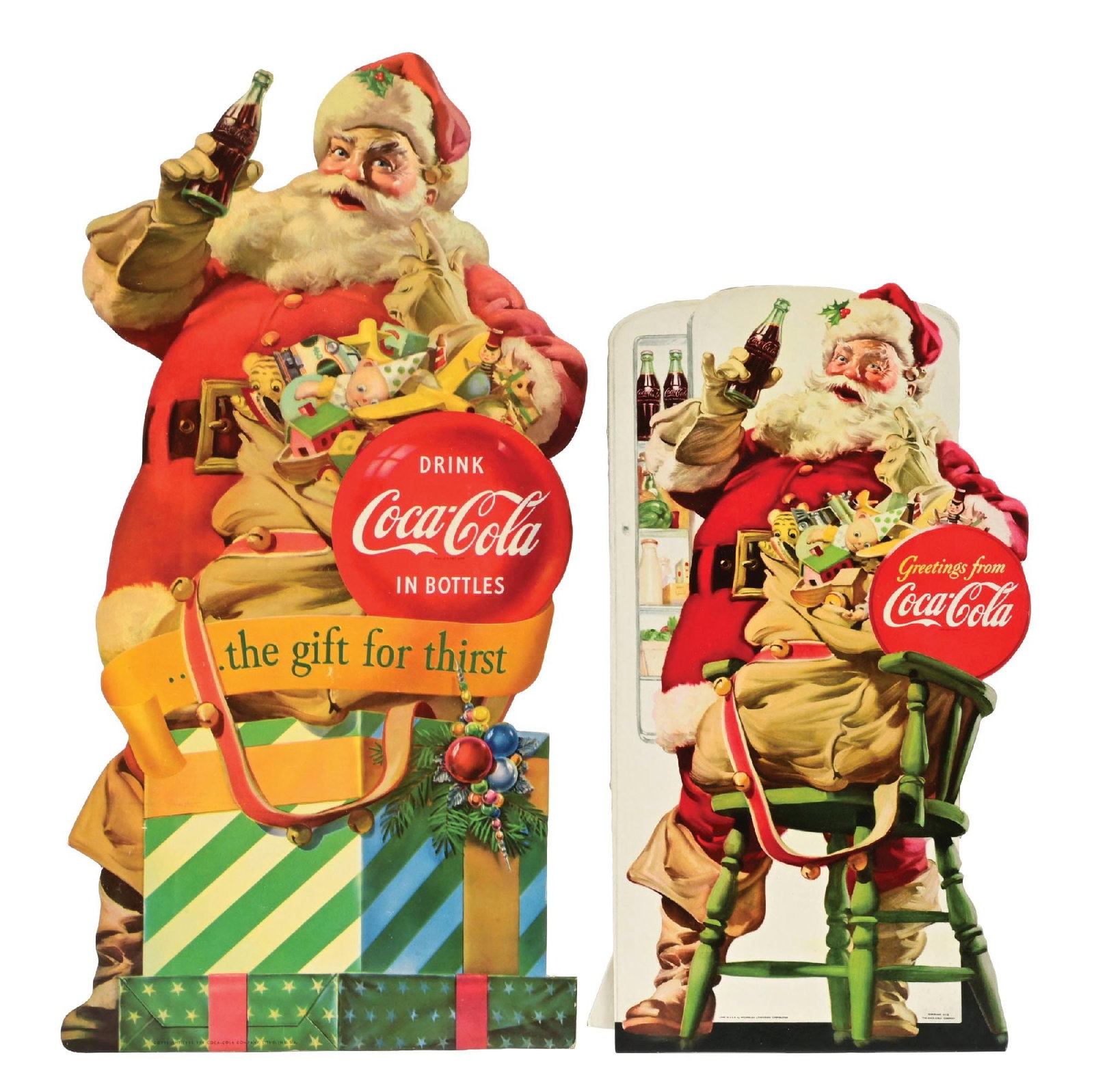 COLLECTION OF 2: CHRISTMAS COCA-COLA CARDBOARD SANTA CLAUS SIGNS: A nice collection of two cardboard easel-back Santa Claus signs from Coca-Cola: years 1948 and 1953. CONDITION: Both remain clean, with easels attached. They show some hardly mentionable edgewear in a
