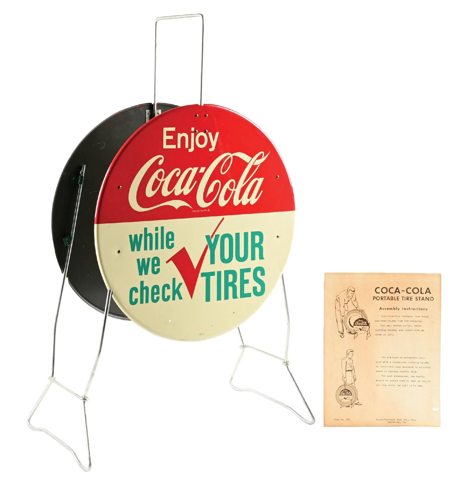 COCA-COLA PORTABLE TIRE STAND W/ INSTRUCTIONS: A near-mint example of this c. 1960s tin tire stand display from Coca-Cola, complete with its original assembly instructions. CONDITION: This display remains in very clean condition with only a few
