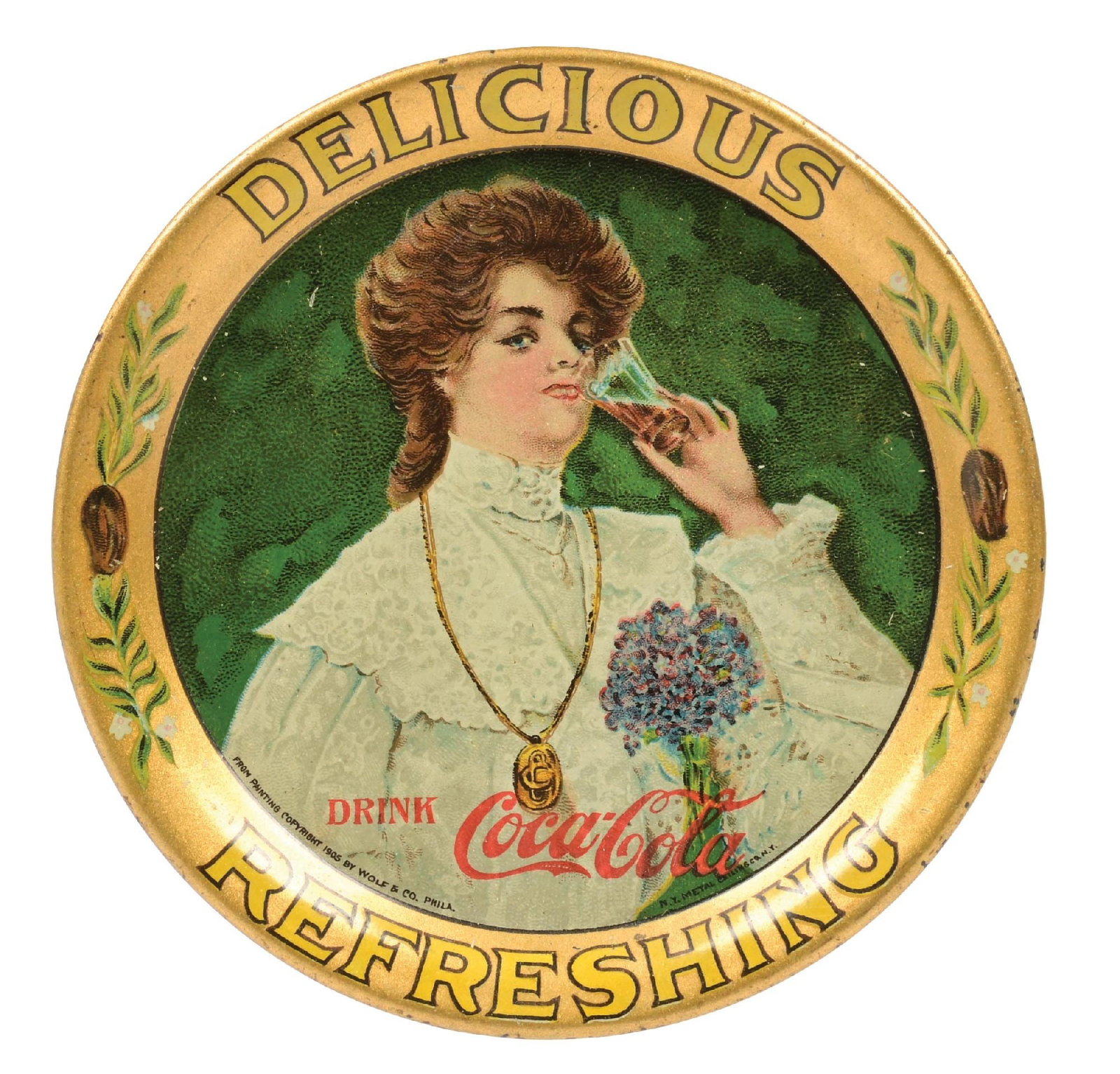 1906 COCA-COLA TIP TRAY: A nice example of this c. 1906 tip tray with "Juanita" graphic. CONDITION: The tray remains clean with a slight dullness to the gloss. Condition: (8.9). Dimensions: 4" Dia.