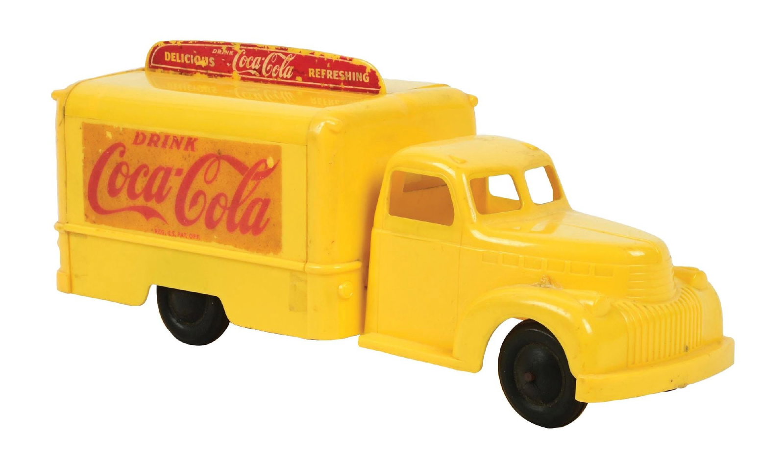MARX COCA-COLA TOY TRUCK W/ SMALL BOTTLES: A good looking example of this c. 1950s plastic toy truck made by Marx for Coca-Cola. This example is complete with miniature bottles. CONDITION: The Coca-Cola logos on the body of the truck and