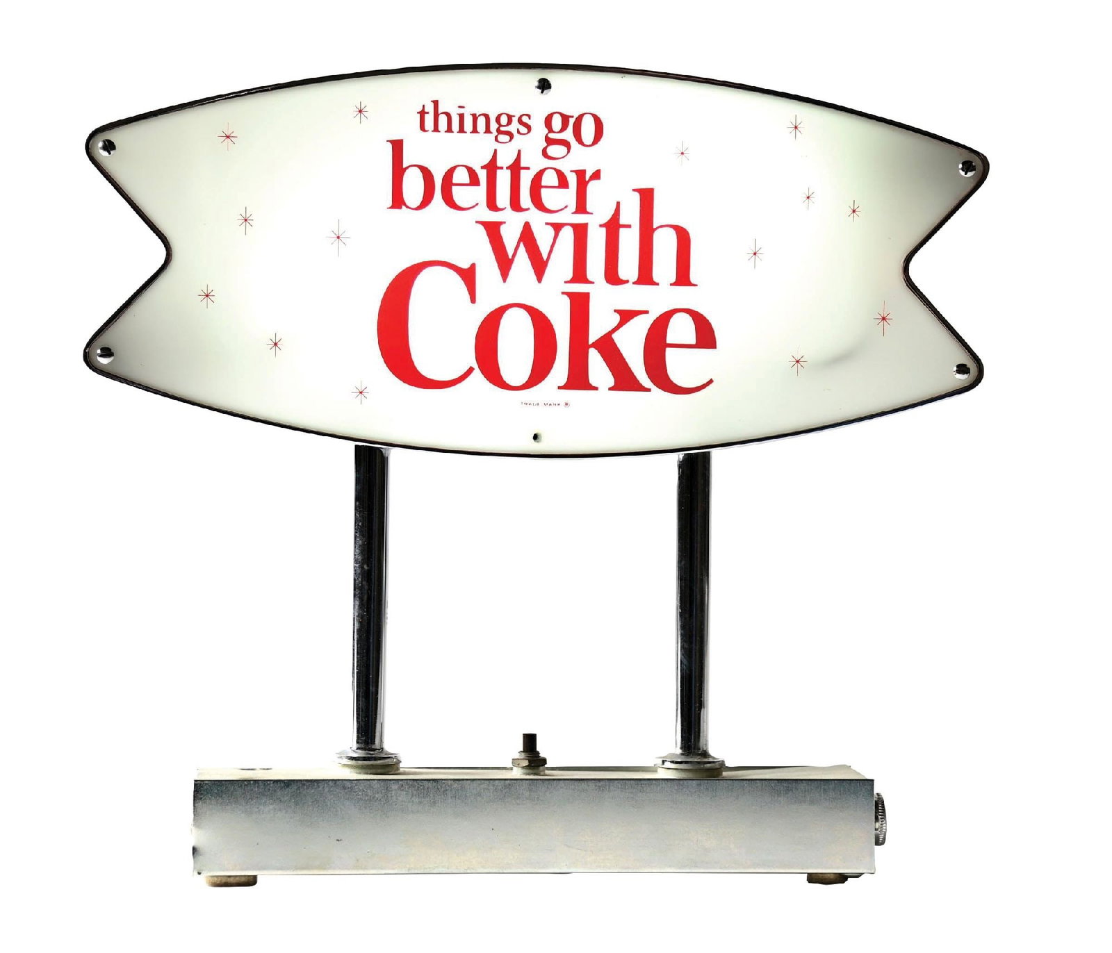 THINGS GO BETTER WITH COKE LIGHT-UP FISHTAIL SIGN: A nice example of this c. 1960s countertop light-up sign from Coca-Cola features the fishtail logo with "Things Go Better with Coke" tagline. CONDITION: The sign shows light wear to the metal finishes