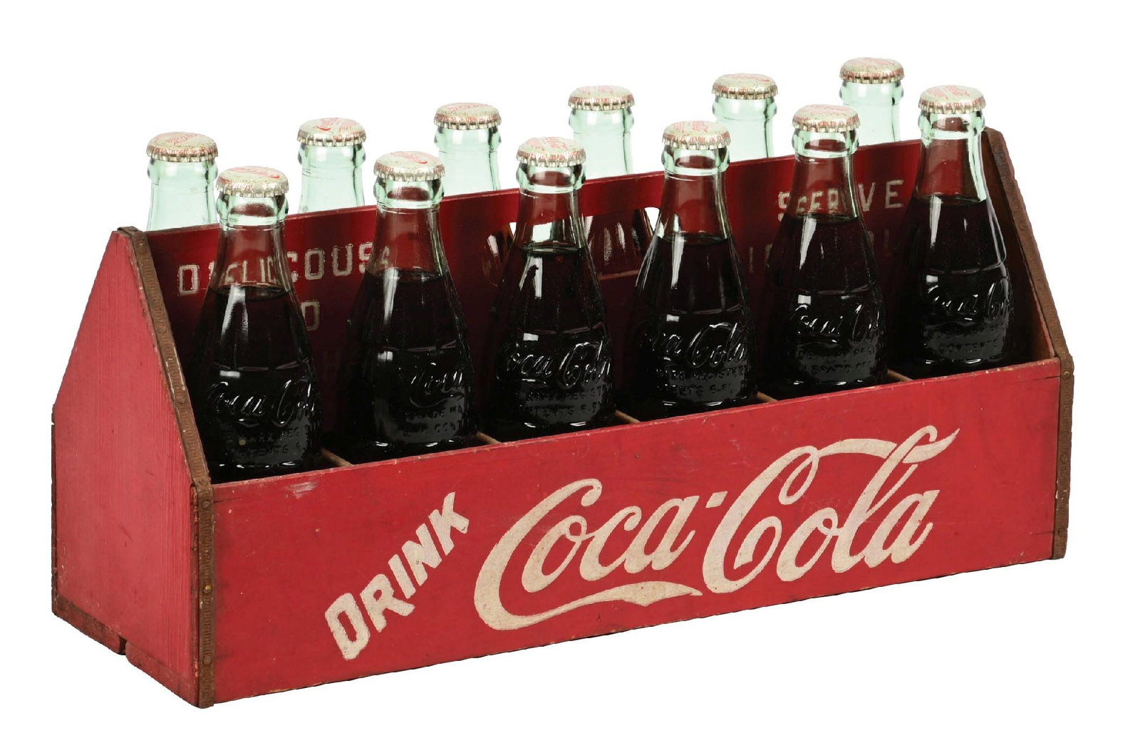 RARE COCA-COLA TWELVE-PACK WOODEN CARRIER: A desirable example of this c. 1930s-1940s wooden twelve-pack carrier from Coca-Cola featuring the script logo and diagonal "Drink" on both sides. CONDITION: The carrier remains in nice condition