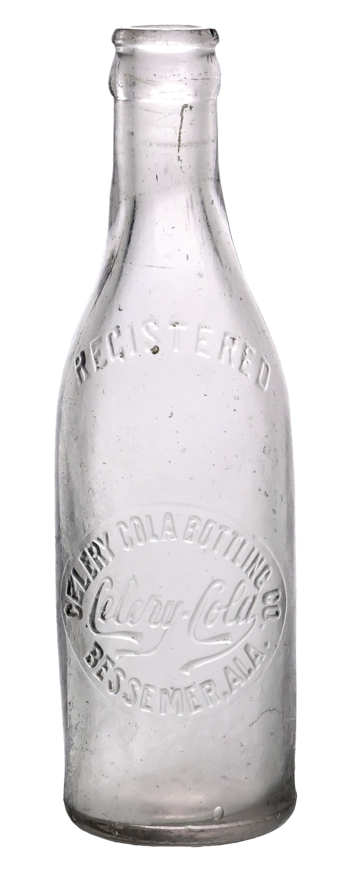 CELERY COLA BESSEMER AL CLEAR SCRIPT BOTTLE: Celery-Cola Bottling Company Bessemer, Alabama. A good looking example of this clear glass, script logo bottle from Celery-Cola of Bessemer, Alabama. CONDITION: The bottle shows haziness to the glass