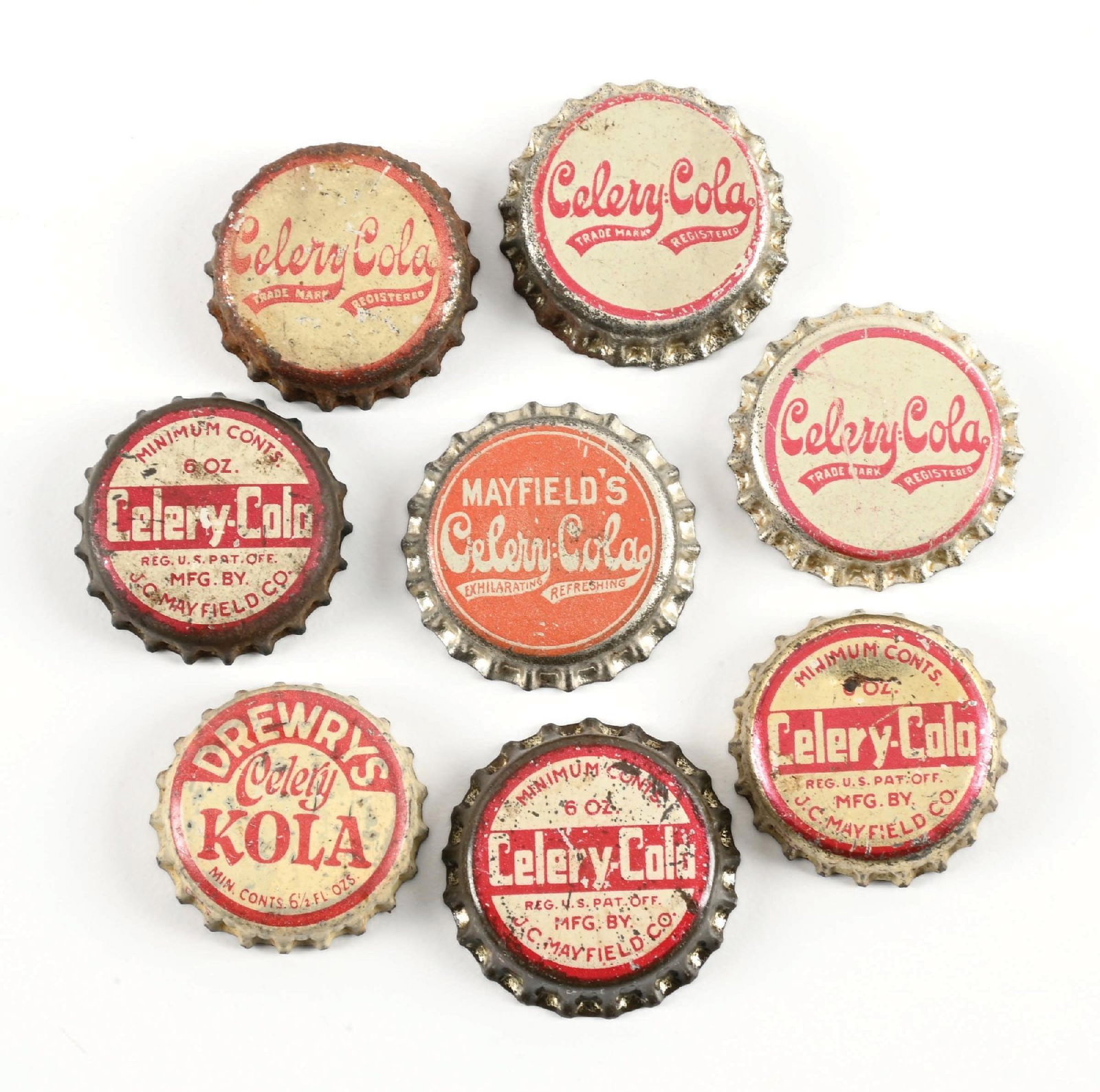 COLLECTION OF 8: VARIOUS YEARS CELERY-COLA BOTTLE CAPS: A wonderful instant collection of eight Celery-Cola bottling caps from various years with script and block letter logos. CONDITION: All remain clear and legible, with some showing some color loss and