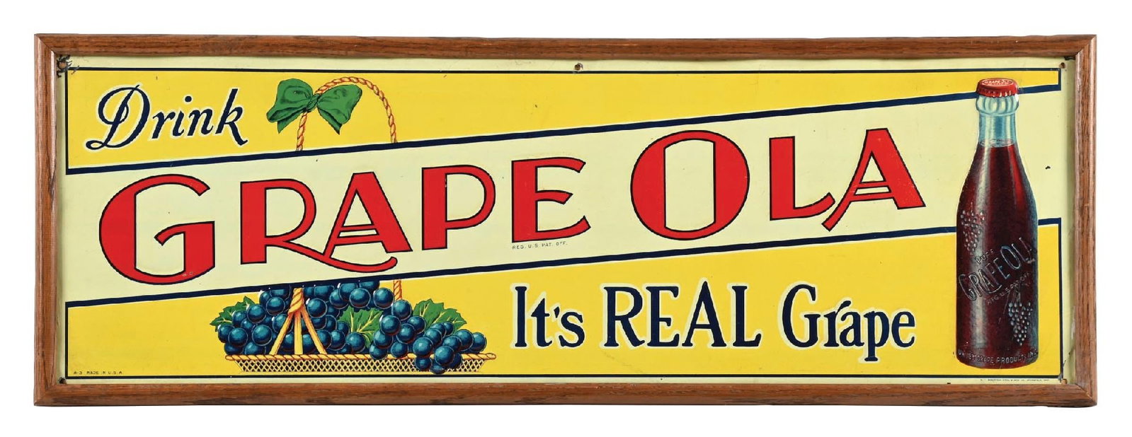 DRINK GRAPE OLA IT'S REAL GRAPE EMBOSSED TIN SIGN W/ WOOD FRAME: SST. Maker Marked Robertson Steel, Springfield, Ohio. CONDITION: Excellent color and gloss throughout, showing clean field with bright colors. Minimal areas of light wear in the outer field with paint