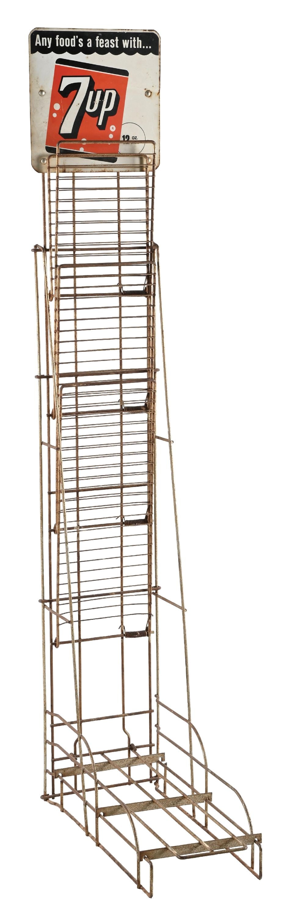 7UP 6-PACK FLOOR RACK: CONDITION: Showing surface rust and oxidation overall to the bent wire frame. The 7UP sign is original, showing areas of missing paint, light surface rust, and areas of corrosion, primarily at the top