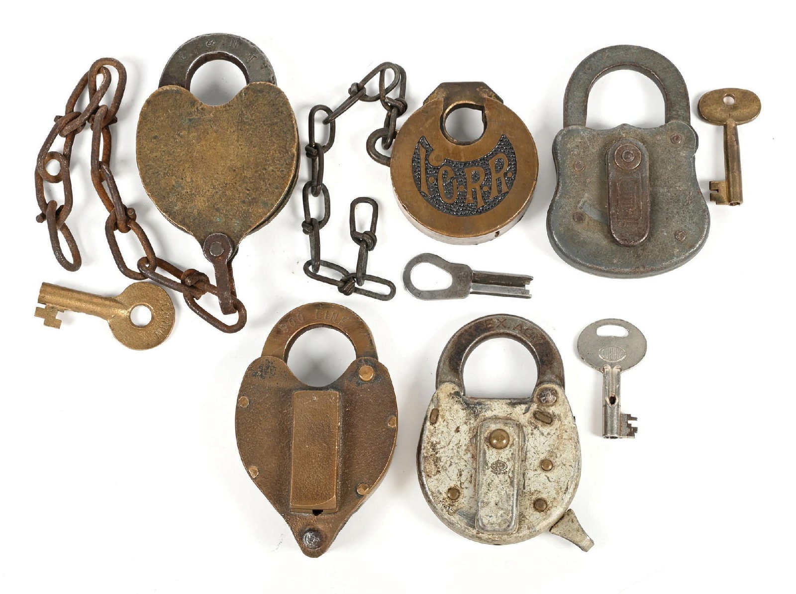 LOT OF 5: RAILROAD LOCKS: (A) A smaller brass padlock made by Slaymaker. Shackle is incised “C&NW”. Old original chain is intact. There is a bronze switch key made by Adlake and incised “C&NW”, which wo