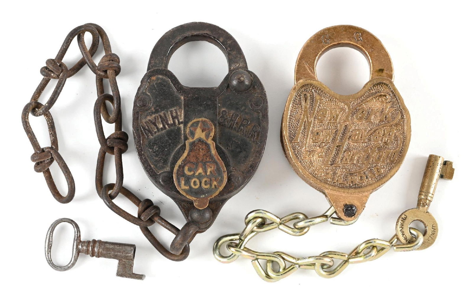 LOT OF 2: RAILROAD LOCKS: (A) A cast iron Car Lock, nicely embossed “N.Y.N.H.&H.R.R.” in an arc on the lock face. The teardrop-shaped dust cover is not sprung, and is nicely embossed with a star and “CAR
