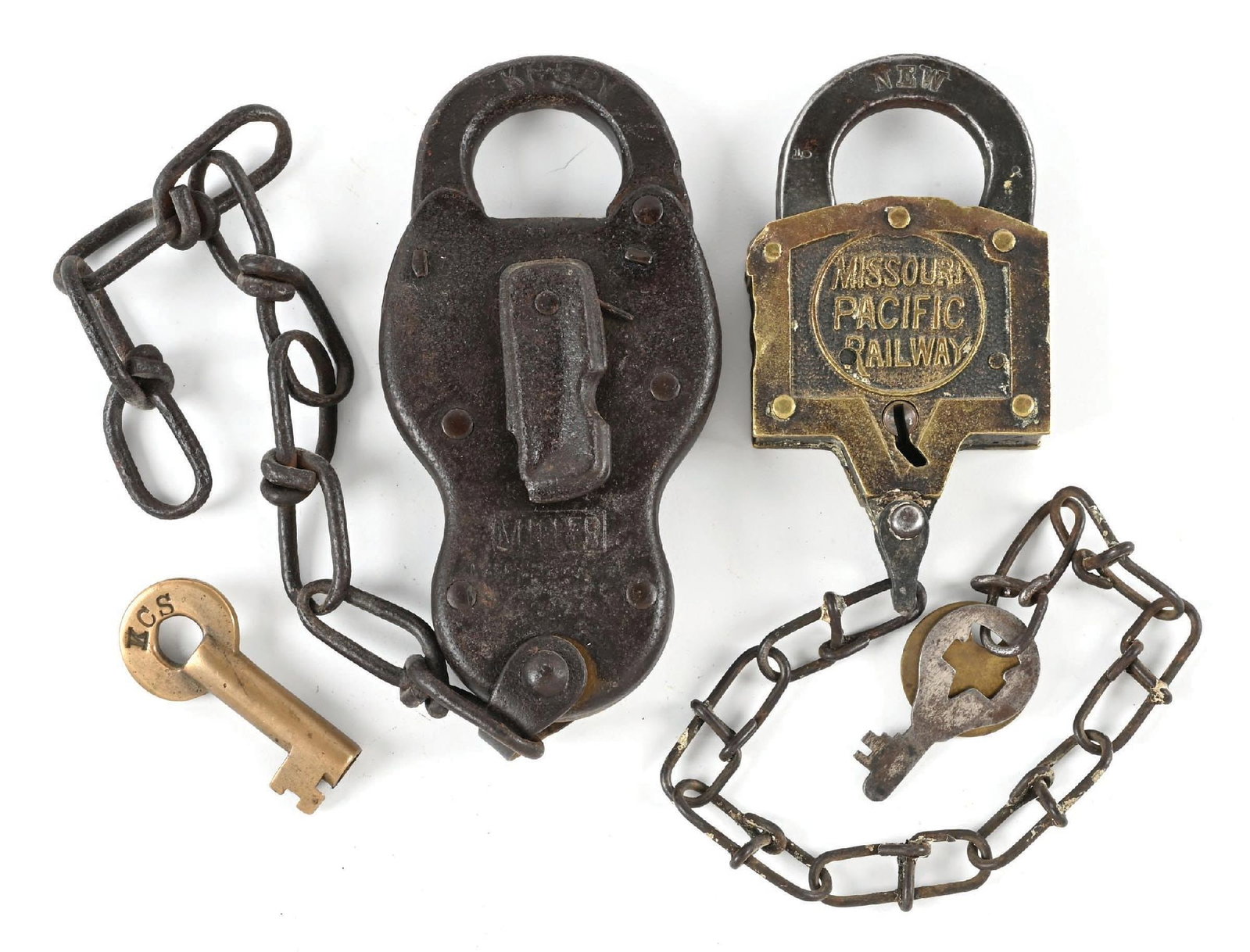 LOT OF 2: RAILROAD LOCKS: (A) A steel switch lock, incised on the shackle “KCS RY”, made by the Miller Lock Co. (incised on the shackle). The Miller logo is incised on the front face. A nice Slaymaker bronze switch
