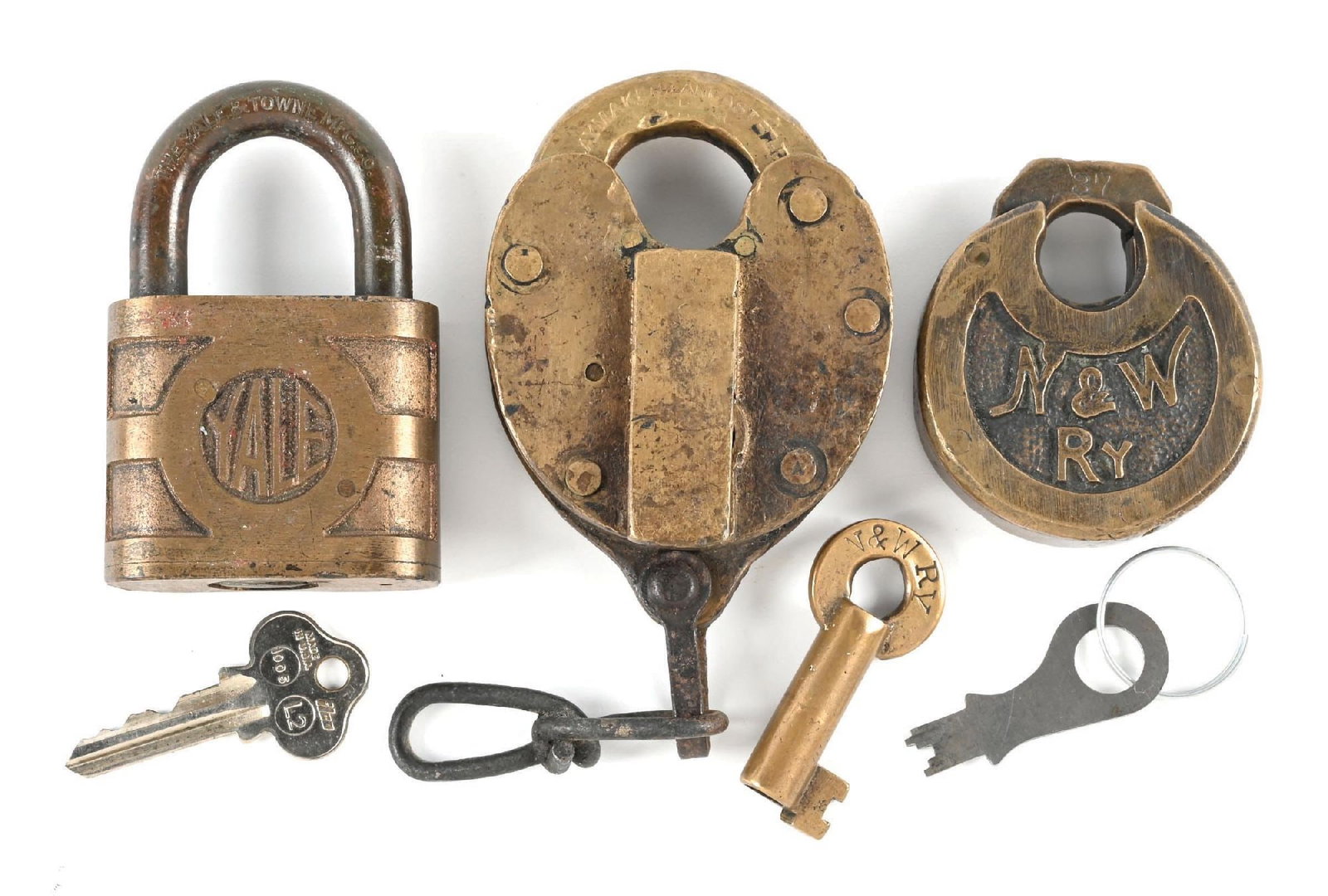 LOT OF 3: RAILROAD LOCKS: (A) A bronze Yale signal lock, nicely embossed “NICKEL PLATE R.R.”, surrounded by “SIGNAL DEPARTMENT” incised. There is a flat key included, which opens the lock. (B) A bronze 