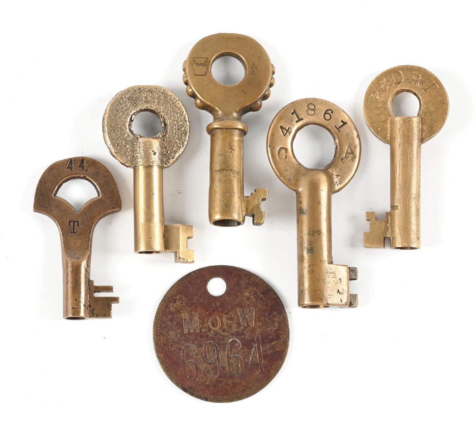 LOT OF 6: RAILROAD SWITCH KEYS & MISC.: (A) A larger bronze key, incised “C41861A” on the hilt, no railroad mark. (B) A knobby bronze key, nicely incised “P.R.R” in serif font on the hilt with the Fraim Keystone