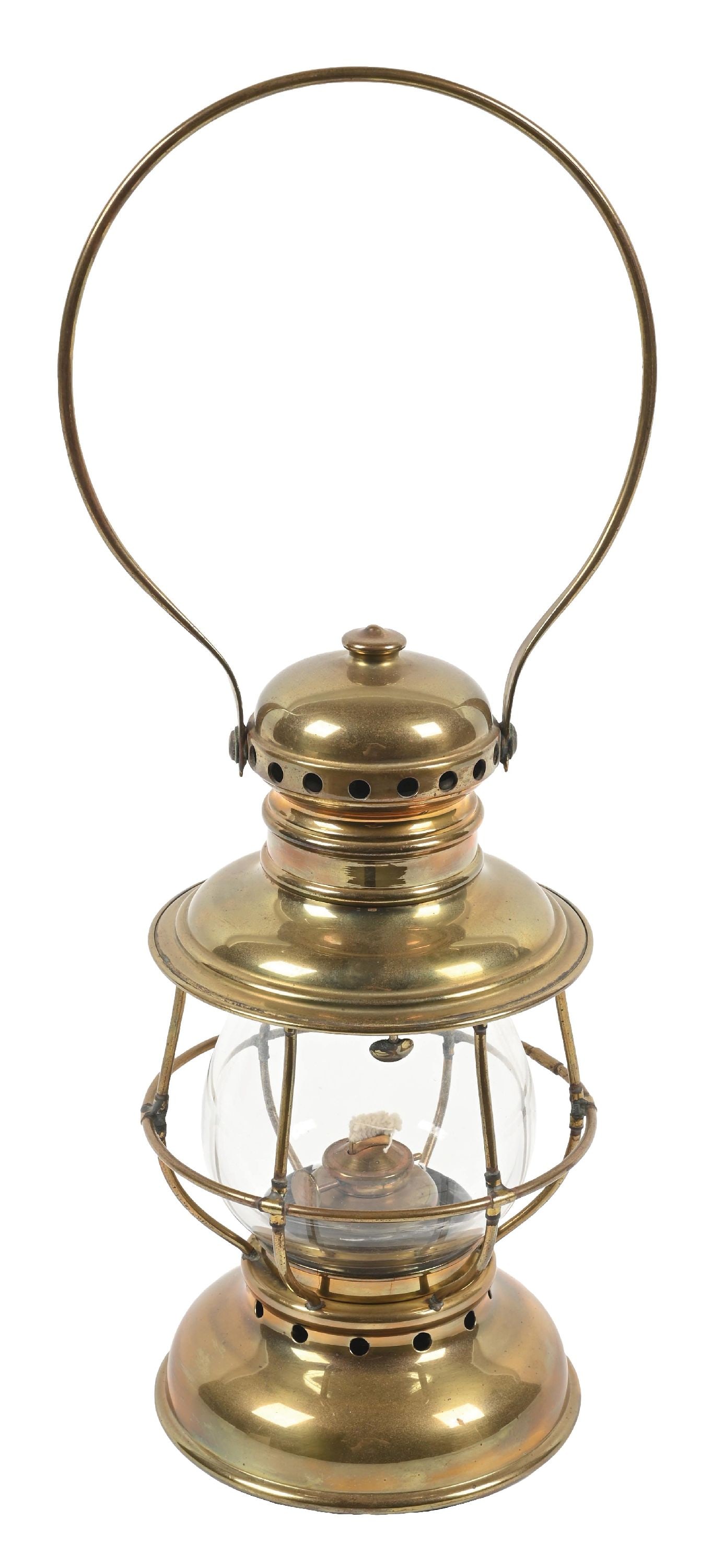 RAILROAD CONDUCTOR’S LANTERN: An Adams & Westlake single-guard, brass “Queen” model. The clear globe is correct for this model and has fire-finished ends. The globe holder is steel and shows some surface rust.
