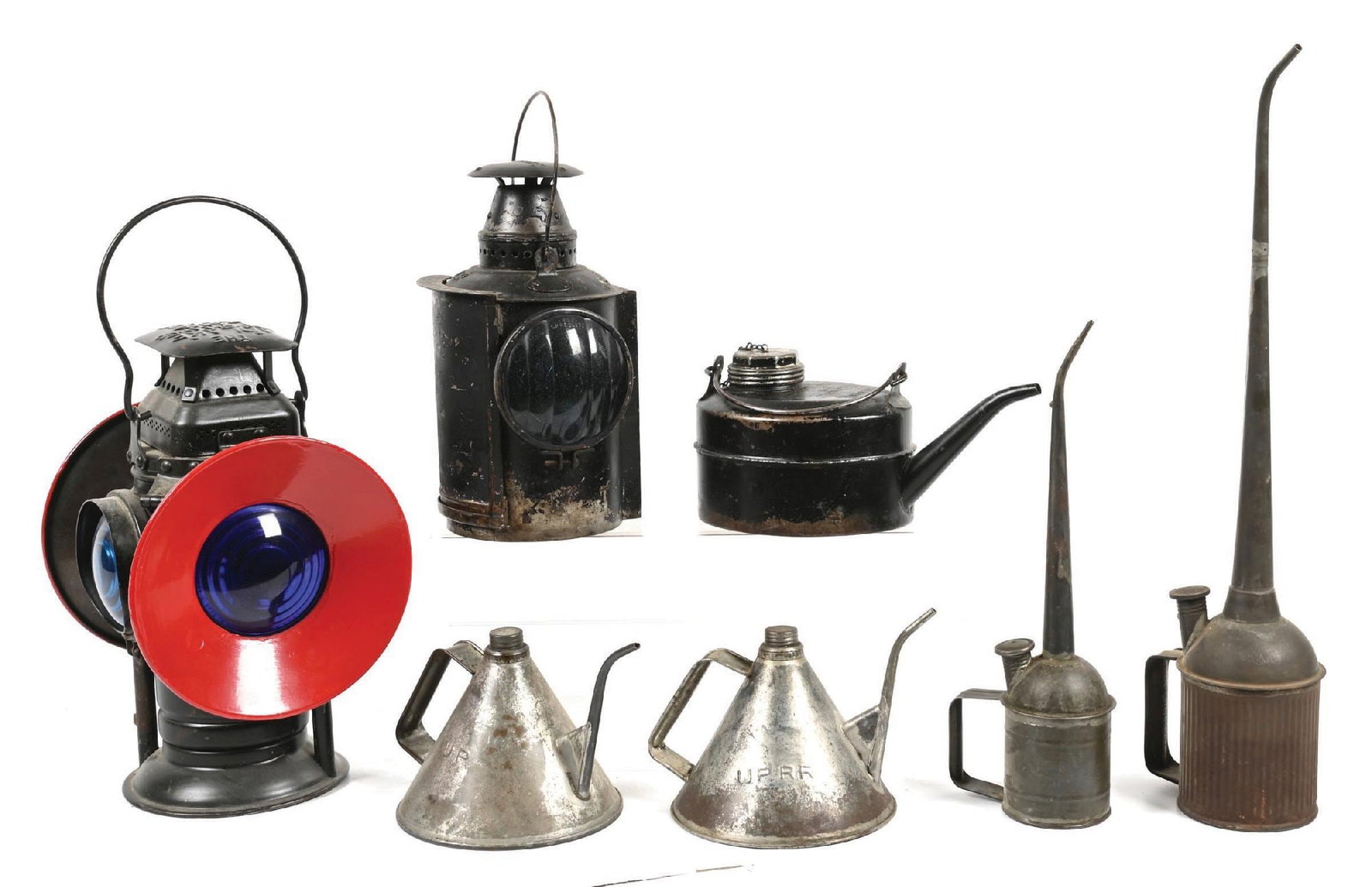 LOT OF 7: UNION PACIFIC ASSORTED LOT: (A) An Adlake fork-mount bell-bottom switch lamp, incised on the base “UPRR”. Includes two red day targets with cobalt blue lenses and two target-less green lenses. The fount and burner as