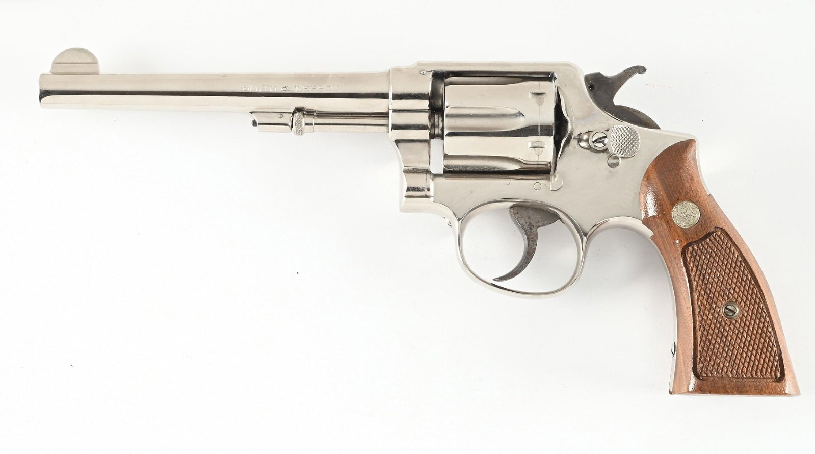 (C) SMITH & WESSON M&P .38 PRE-MODEL 10 DOUBLE ACTION REVOLVER.: Numbered in the pre-War range, this revolver displays post-War features. It is finished in factory reapplied nickel as denoted by a star stamped on the reverse of the cylinder and a boxed "R-N" on the