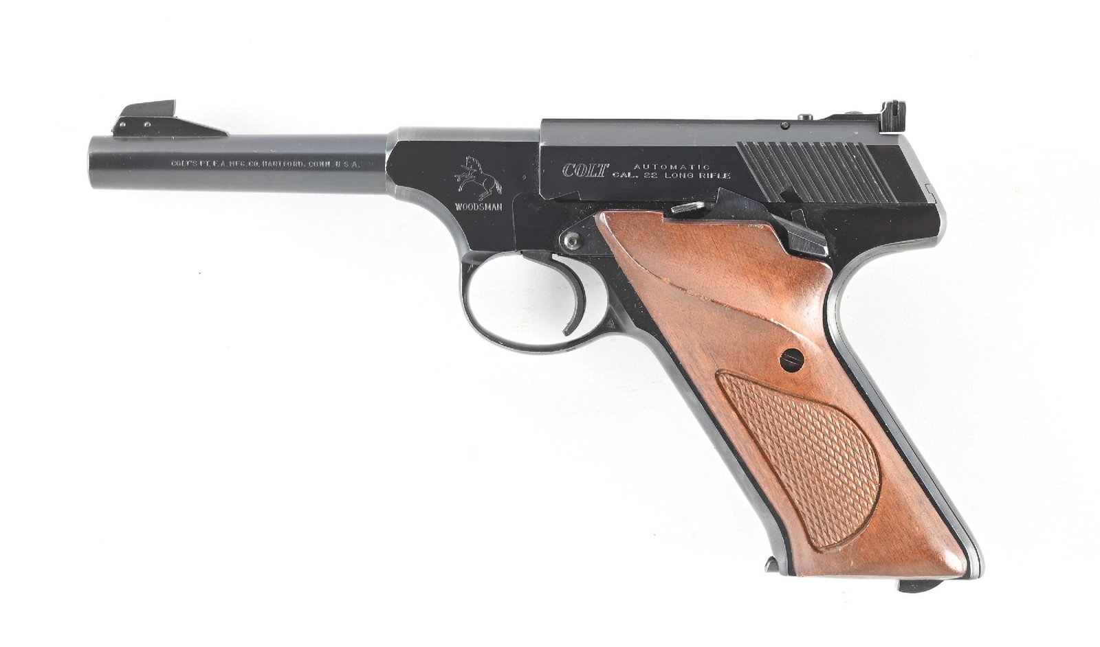 (C) COLT WOODSMAN 2ND ISSUE SEMI-AUTOMATIC TARGET PISTOL.: Dates to 1929. Standard dual blue finish, adjustable rear sight, pinned blade on base front sight, checkered walnut grips with one Colt stamped magazine. CONDITION: Excellent. Retains nearly all of it