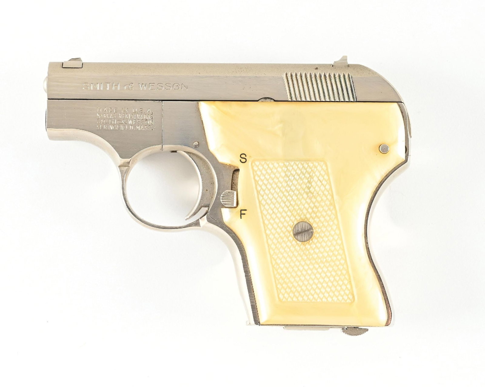 (C) NICKEL SMITH & WESSON MODEL 61-2 .22 LR SEMI-AUTOMATIC PISTOL.: Offered circa 1970-71, this small pocket automatic features the dual tone nickel finish, pearlite type grips , fixed sights and comes with one S&W stamped magazine. CONDITION: Excellent. Retains nearl