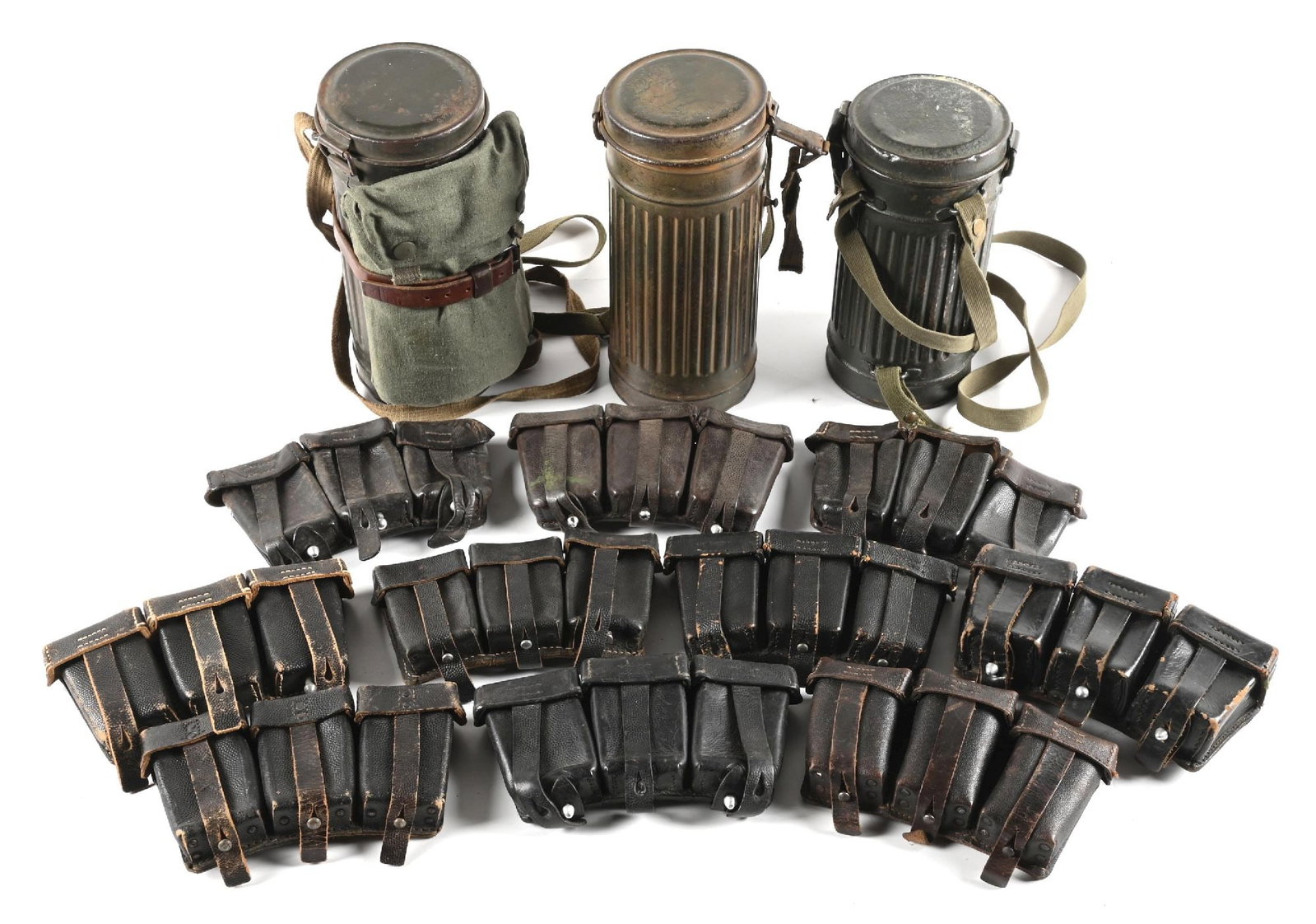 LOT OF GERMAN WWII MAGAZINE POUCHES AND GAS MASK CANS: Large lot of German WWII k98k rifle ammo pouches and 3 gas mask cans. One can has the gasmask and another has remnants of camouflage paint. CONDITION: Overall good.