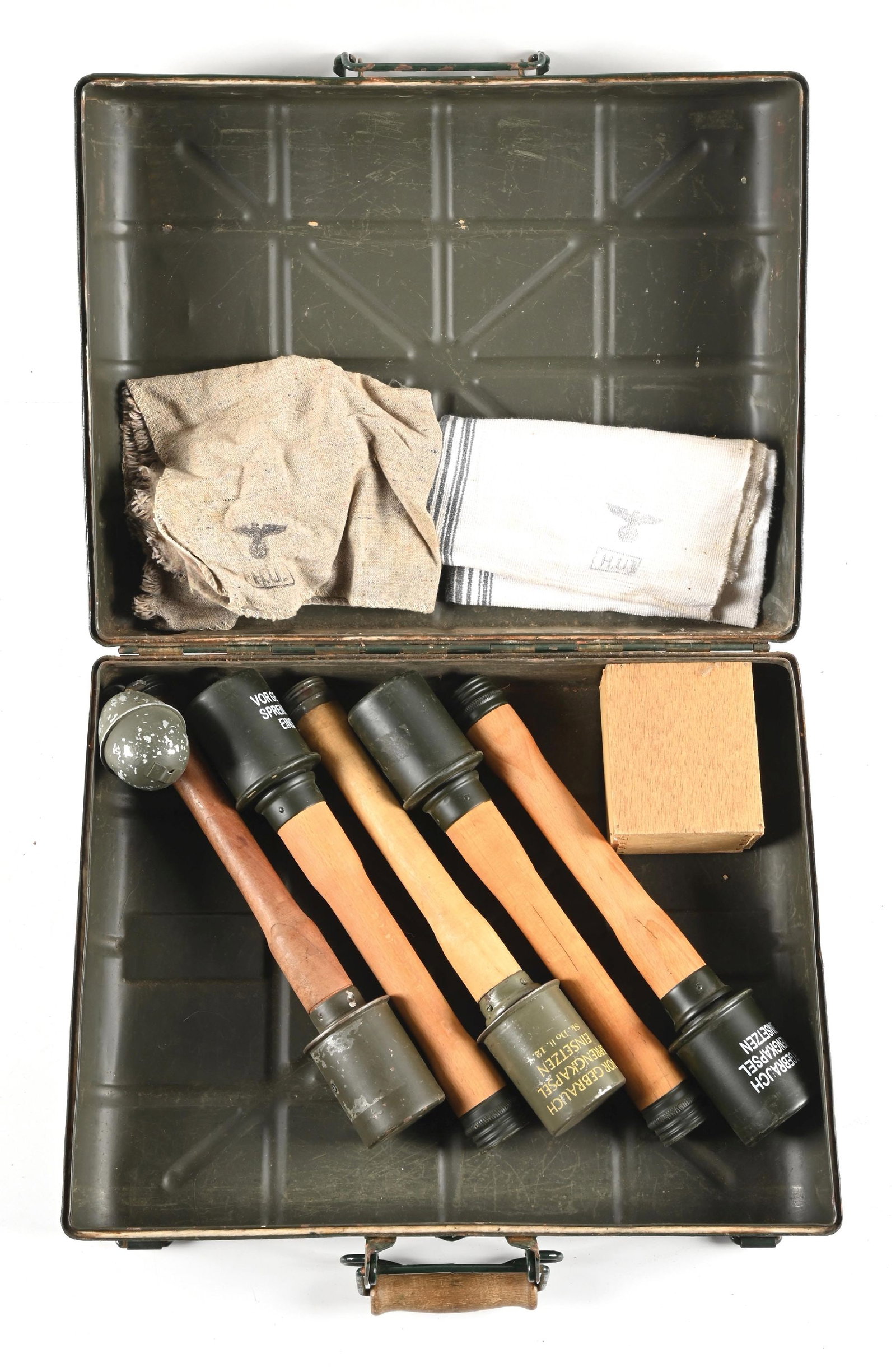 THIRD REICH M24 GRENADE CASE.: German WWII M24 grenade case that has had its exterior repainted with the exception of the original markings. Included are five reproduction M24 stick grenades, a reproduction M39 egg grenade, and