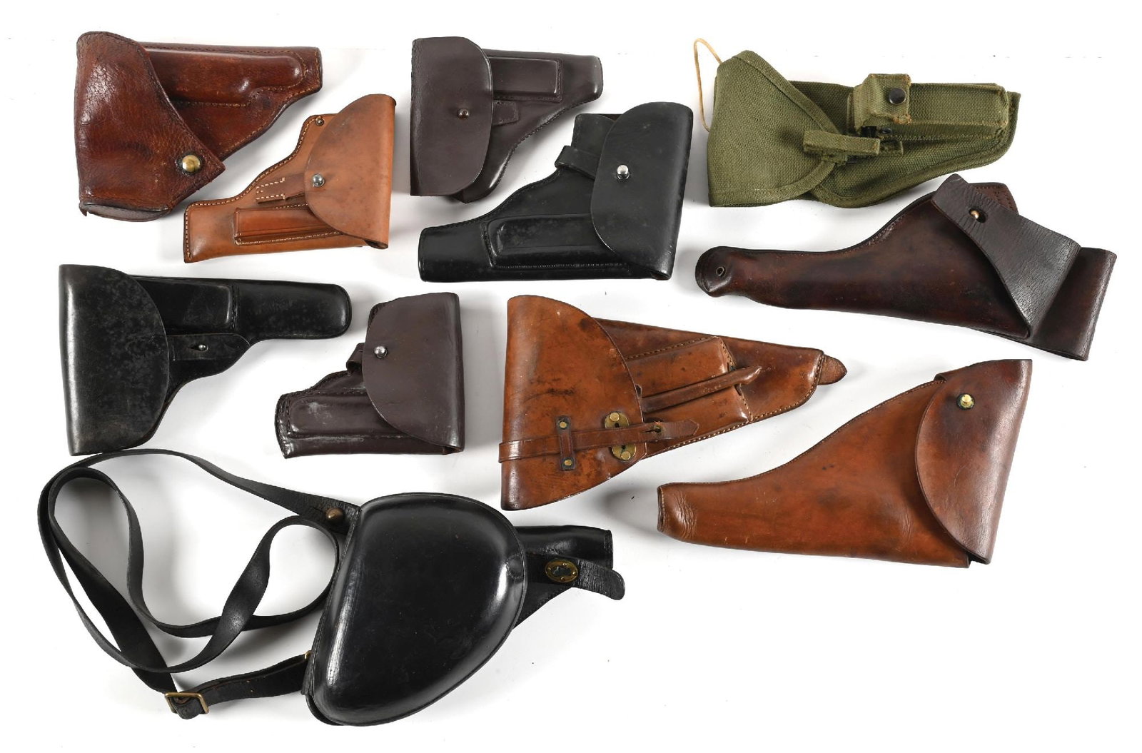 LOT (11) MISCELLANEOUS VINTAGE MILITARY HANDGUN HOLSTERS. (1 of 1)