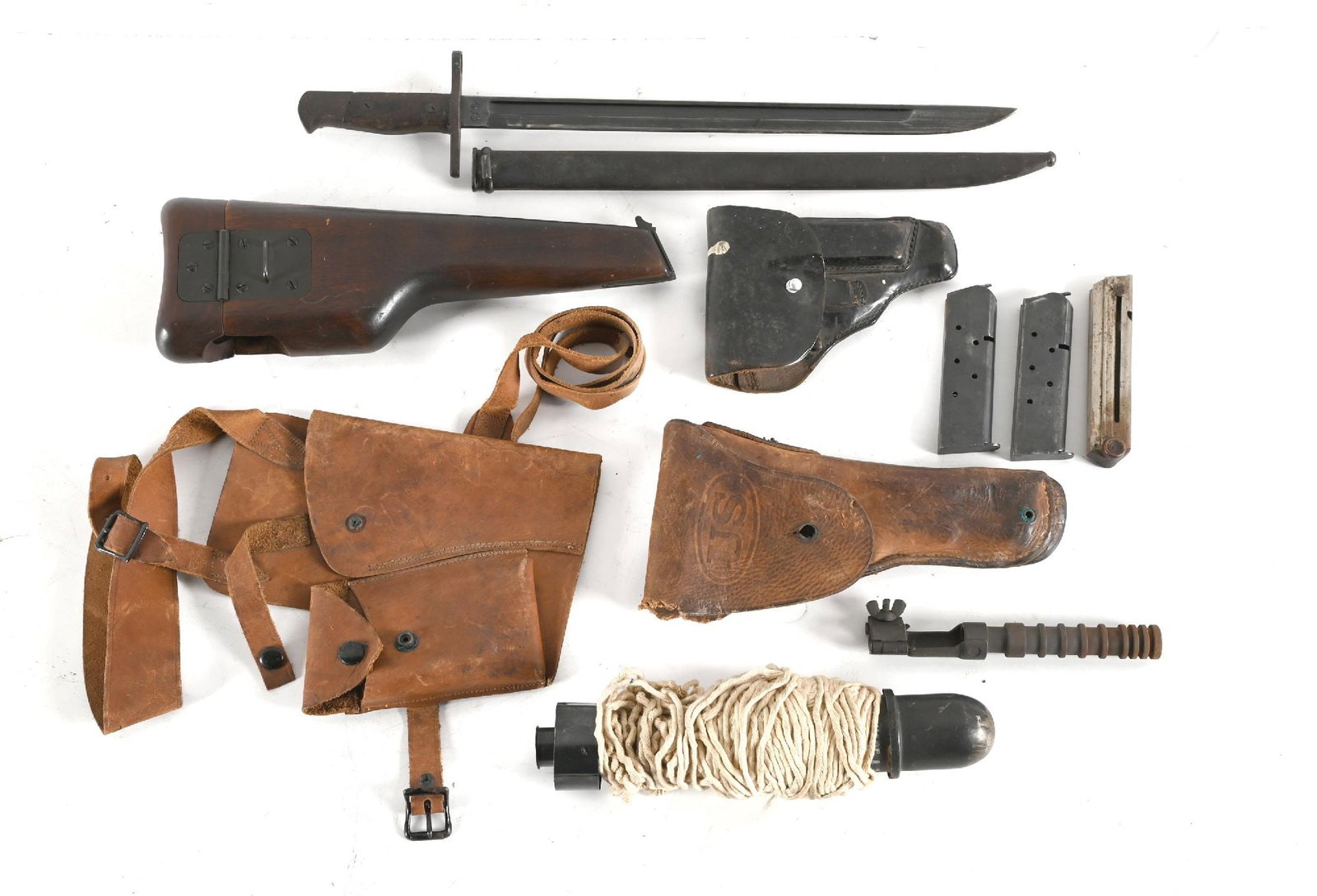 LOT OF HOLSTERS AND MAGAZINES. (1 of 2)