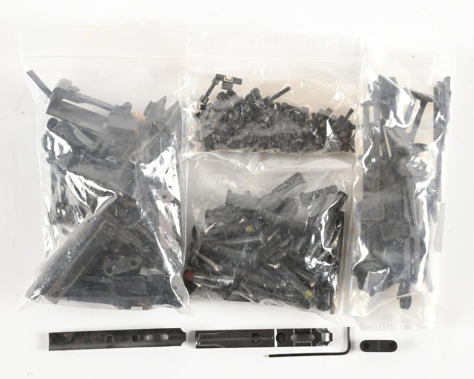 LARGE LOT OF FIREARMS REAR RIFLE SIGHTS, TANG SCREWS, FILLER SCREWS. (1 of 1)