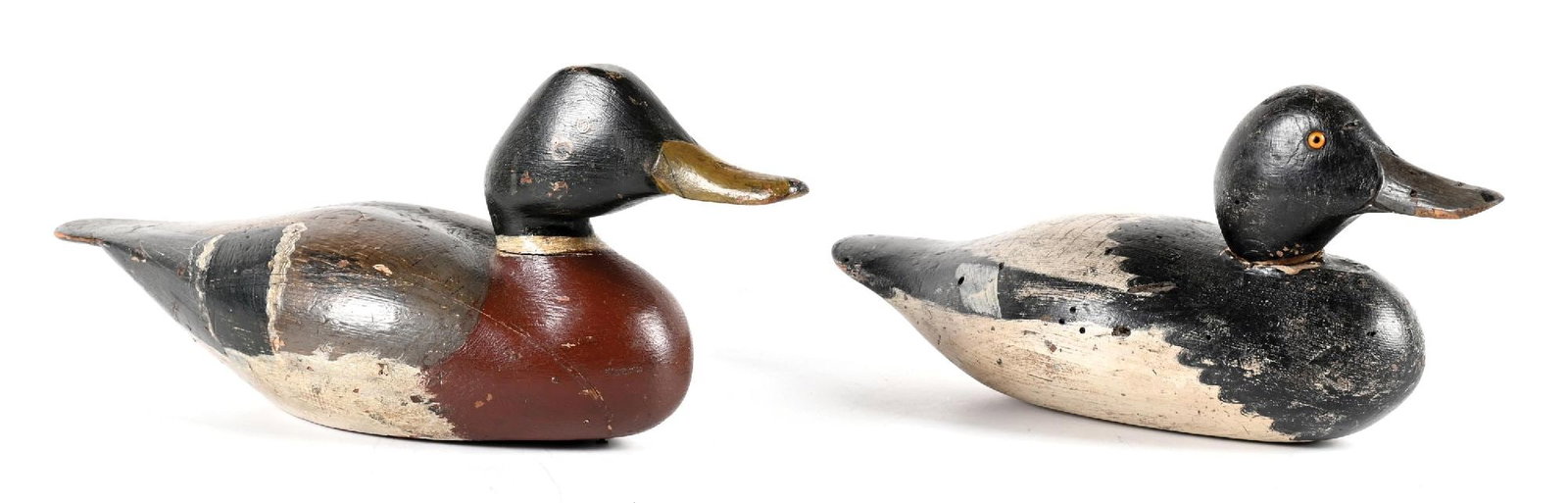 A PAIR OF VINTAGE WOODEN DUCK DECOYS (1 of 2)