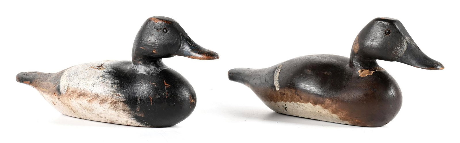 A PAIR OF VINTAGE WOODEN DUCK DECOYS (1 of 2)