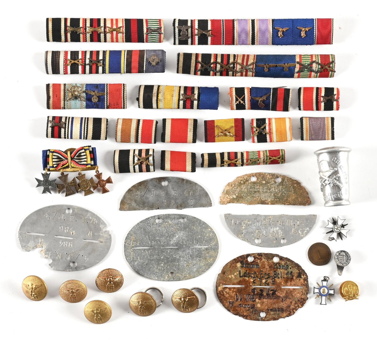 LOT OF GERMAN WWI AND WWII RIBBON BARS, BUTTONS, AND DOG TAGS.: Lot of Imperial German and WWII ribbon bars, buttons and dog tags. Lot includes a nice mix of ribbon bars, buttons, miniature medals, full/ half dog tags, etc. CONDITION: Overall very good.