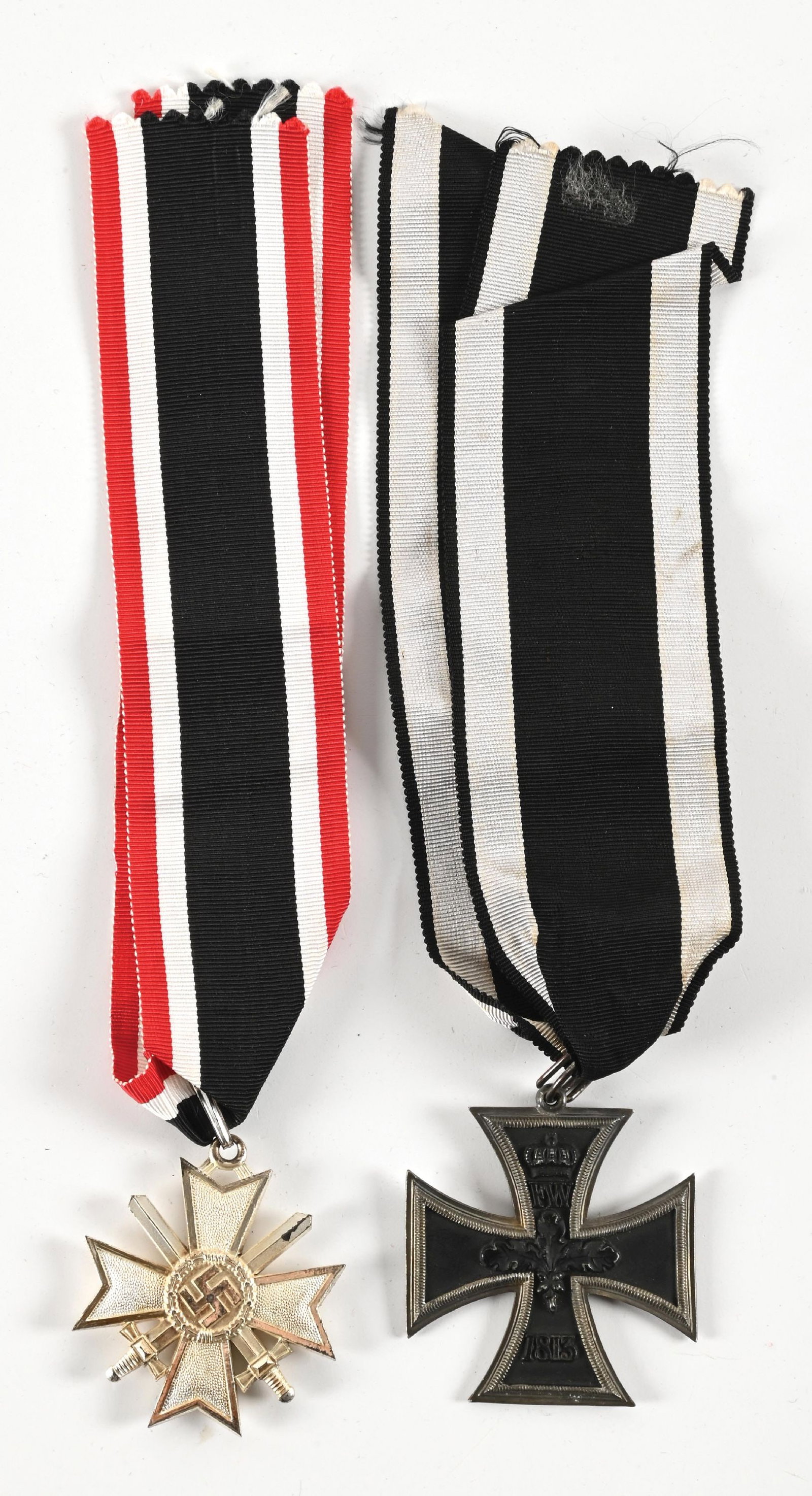 LOT OF 2: THIRD REICH MUSEUM QUALITY REPLICA MEDALS.: Lot includes a post-WWII museum copy of a a War Merit 1st Class Knights Cross with Swords and ribbon, and a museum copy of a Prussian 1870 Grand Cross. CONDITION: Overall excellent.