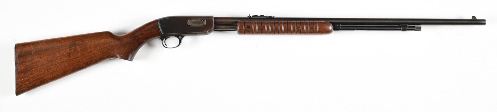 (C) WINCHESTER MODEL 61 SLIDE ACTION RIFLE.: Dates to 1952, this standard rifle features the blue finish, full round barrel, 2/3 magazine, dovetailed bead front sight, flat top sporting rear sight, take down, plain pistol grip walnut stock with 