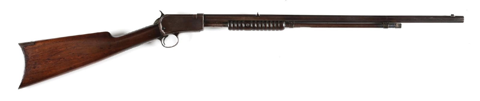 (C) WINCHESTER MODEL 90 .22 LONG RIFLE SLIDE ACTION RIFLE: Dates to 1914. This standard rifle features the full octagon barrel, 2/3 magazine, dovetailed front sight, dovetailed single leaf standing rear sight, blued finish, walnut stock with rifle butt plate 