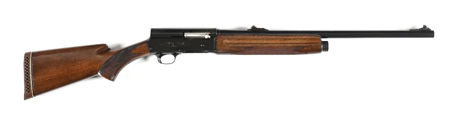 (C) BELGIAN BROWNING MAGNUM TWELVE A5 SEMI-AUTOMATIC SHOTGUN.: Dates to 1973. This shotgun features the short barrel with rifle front and rear sights, blue finish, lightly engraved receiver, checkered square pistol grip with Browning waffle pad and matching forea